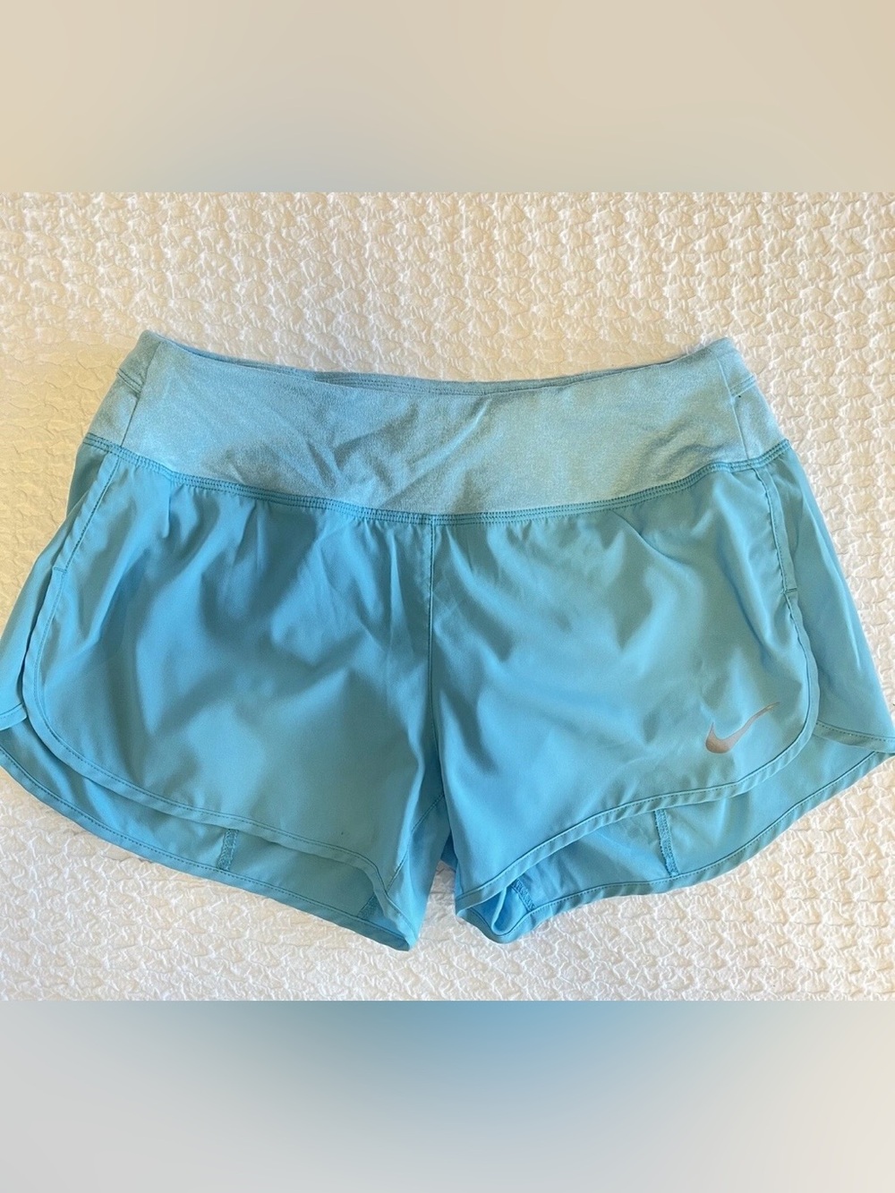 NIKE Women's Athletic Shorts with Adjustable Waist.